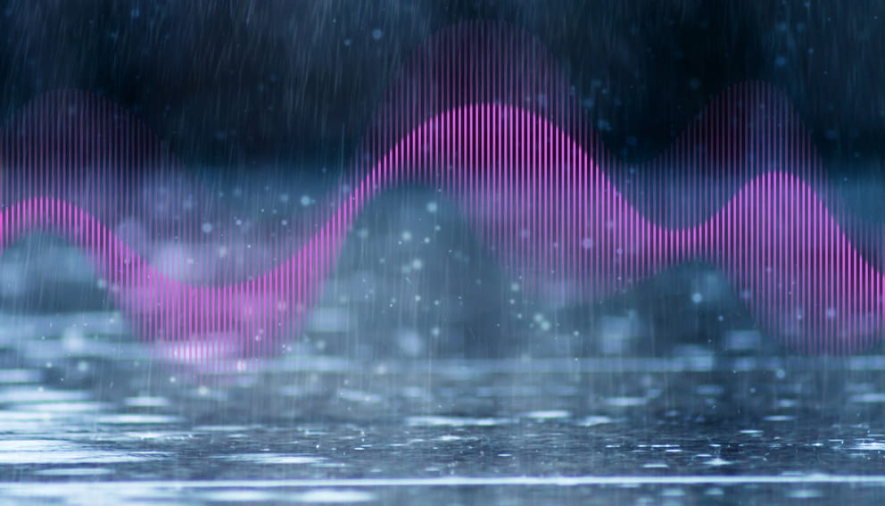 A pink sound wave superimposed over rain
